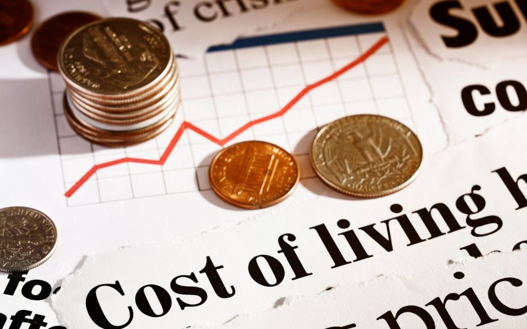 Arjantin'deki yaşam maliyetini gösteren grafik ve madeni paralar